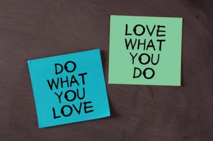'Love What You Do and Do What You Love' notes pasted on blackboard. Dopkins is hiring!
