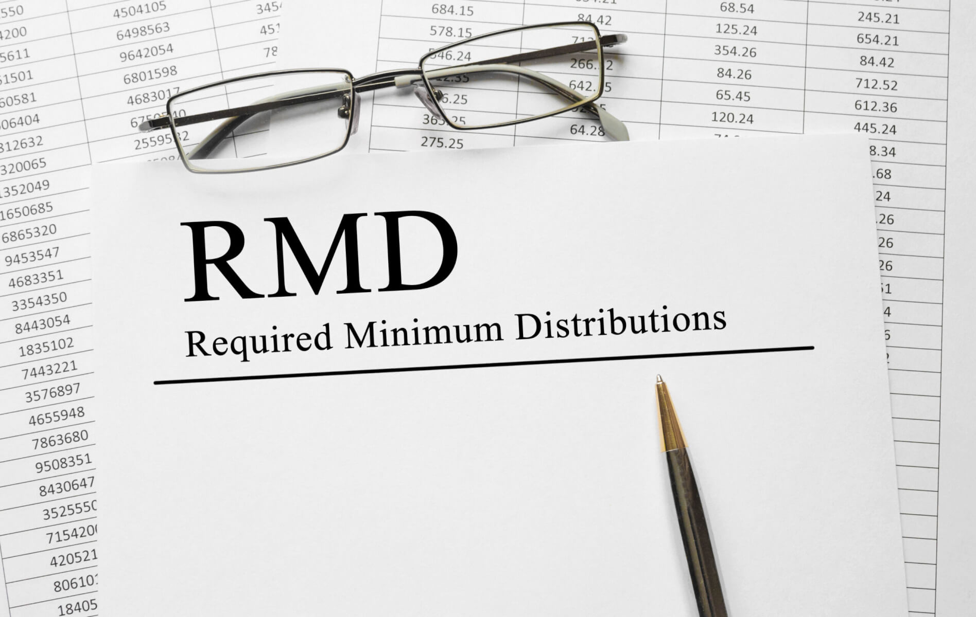 Paper With Required Minimum Distributions RMD On A Table